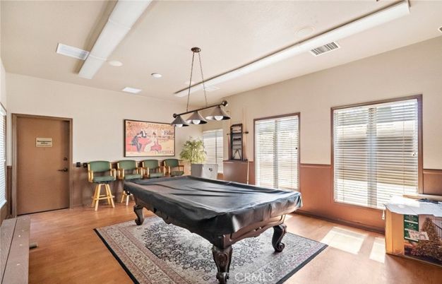 Billiard Table, Chandelier, Game Room, Interior, Pendant Lights, Recessed Lighting, Wood Texture Flooring