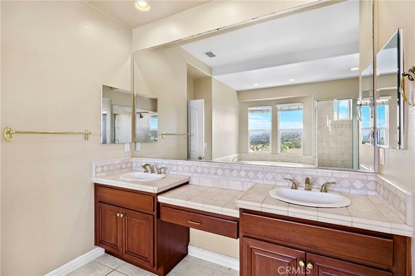 Bathroom, Dual Sink Vanities, Interior, Recessed Lighting, Tile Countertops