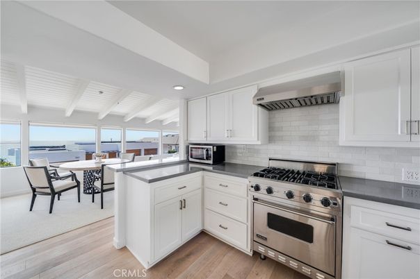 Dining room, Interior, Kitchen, Recessed Lighting, Stainless Steel Appliances, Water, Wood Texture Flooring