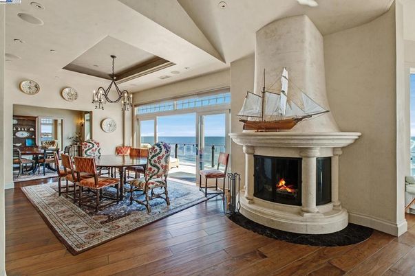 Chandelier, Dining room, Fireplace, Interior, Recessed Lighting, Water, Wood Texture Flooring