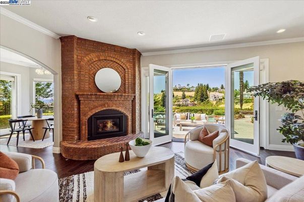 Fireplace, Interior, Living room, Recessed Lighting, Stone Walls, Wood Texture Flooring