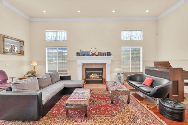 Fireplace, Interior, Living room, Piano, Recessed Lighting, Wood Texture Flooring