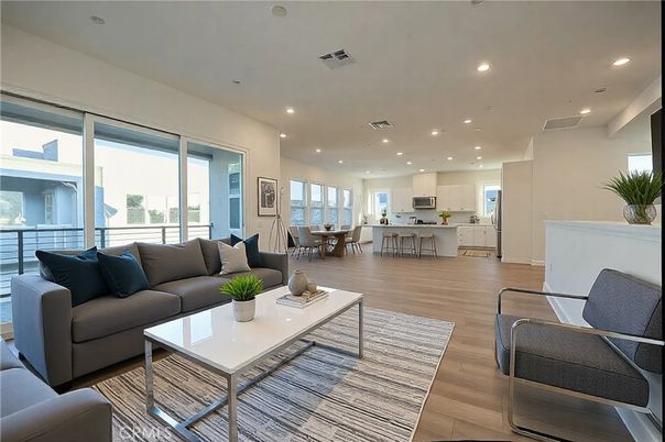 Dining room, Interior, Kitchen, Living room, Recessed Lighting, Stainless Steel Appliances, Wood Texture Flooring