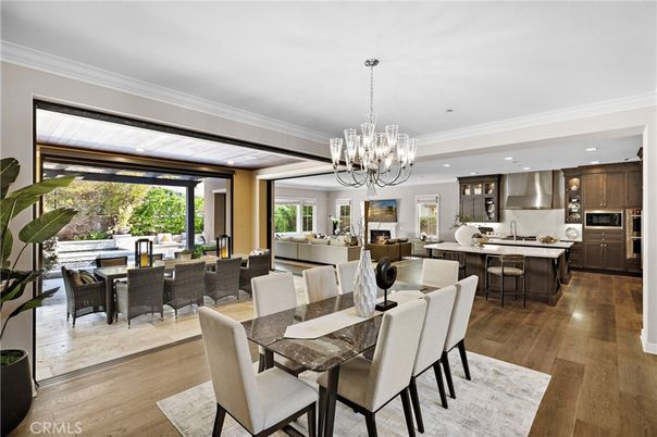 Chandelier, Dining room, Interior, Kitchen, Living room, Recessed Lighting, Stainless Steel Appliances, Wood Texture Flooring