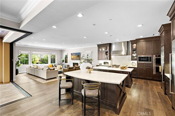 Dining room, Interior, Kitchen, Living room, Recessed Lighting, Stainless Steel Appliances, Wood Texture Flooring