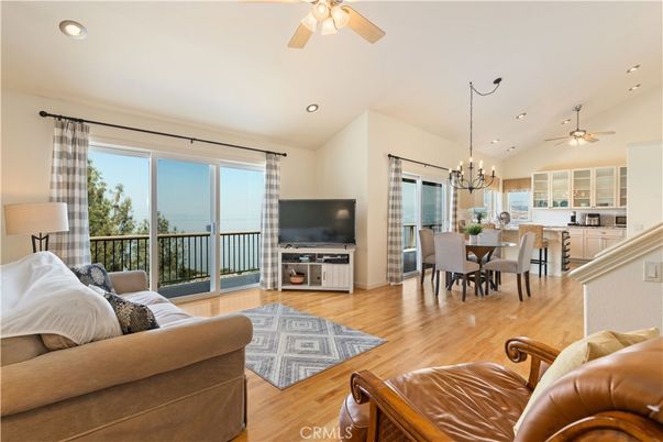 Chandelier, Dining room, Interior, Living room, Recessed Lighting, Water, Wood Texture Flooring