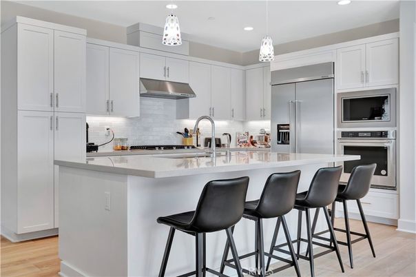 Interior, Kitchen, Pendant Lights, Recessed Lighting, Stainless Steel Appliances, Wood Texture Flooring