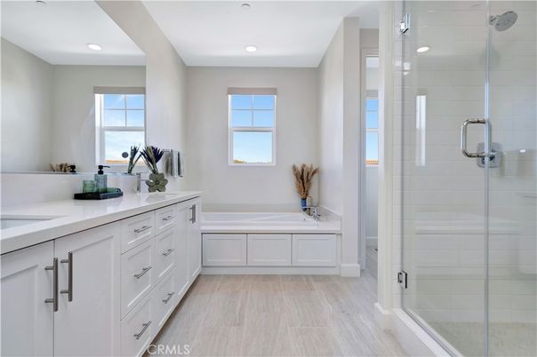 Bathroom, Dual Sink Vanities, Glass Shower, Interior, Recessed Lighting, Wood Texture Flooring