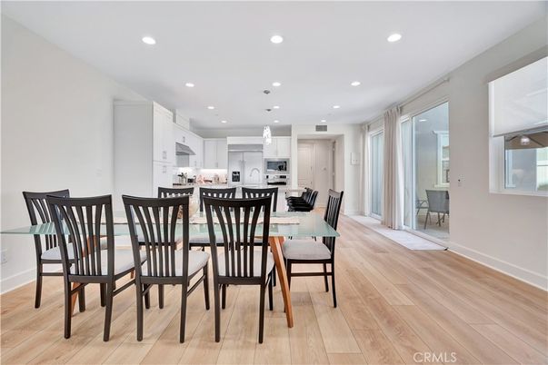 Dining room, Interior, Kitchen, Pendant Lights, Recessed Lighting, Stainless Steel Appliances, Wood Texture Flooring