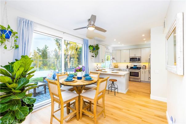 Dining room, Interior, Kitchen, Recessed Lighting, Stainless Steel Appliances, Wood Texture Flooring