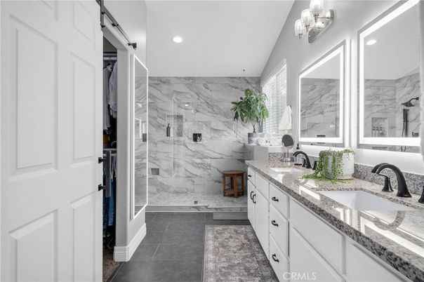Bathroom, Dual Sink Vanities, Glass Shower, Interior, Marble Walls, Recessed Lighting