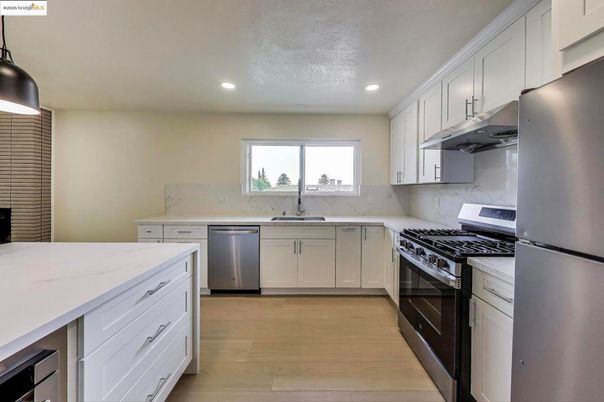 Interior, Kitchen, Recessed Lighting, Stainless Steel Appliances, Wood Texture Flooring