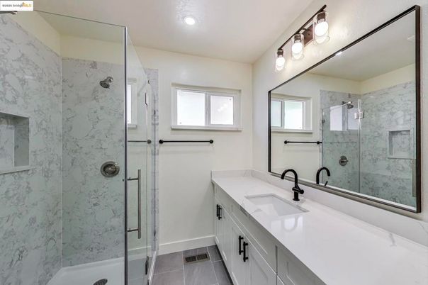 Bathroom, Dual Sink Vanities, Glass Shower, Interior, Marble Walls, Recessed Lighting