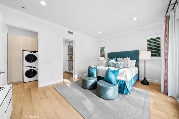 Bedroom, Interior, Recessed Lighting, Utility Closets, Washer, Wood Texture Flooring