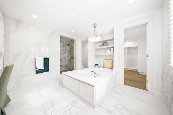 Bathroom, Glass Shower, Interior, Marble, Marble Walls, Recessed Lighting, Wood Texture Flooring