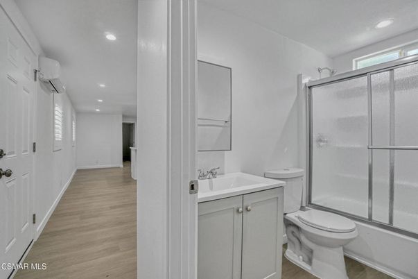 Bathroom, Glass Shower, Interior, Recessed Lighting, Wood Texture Flooring