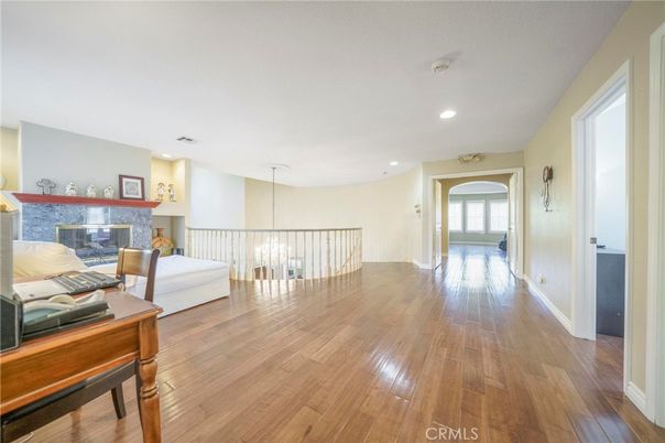 Chandelier, Fireplace, Interior, Recessed Lighting, Wood Texture Flooring