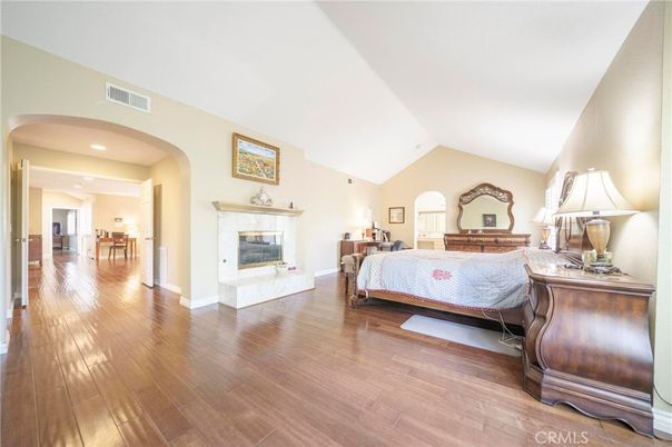 Bedroom, Fireplace, Interior, Recessed Lighting, Wood Texture Flooring
