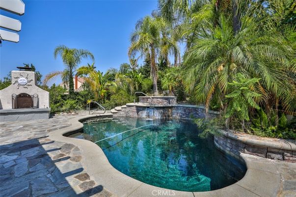 Exterior, Fireplace, Pool
