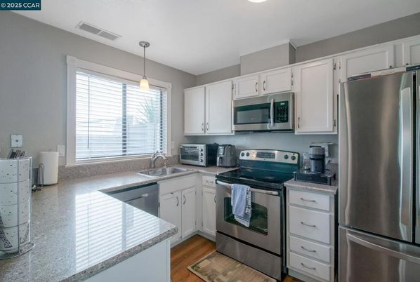 Interior, Kitchen, Pendant Lights, Stainless Steel Appliances, Wood Texture Flooring