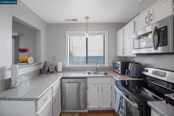 Interior, Kitchen, Pendant Lights, Stainless Steel Appliances, Wood Texture Flooring