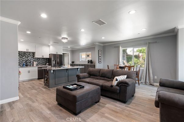 Dining room, Interior, Kitchen, Living room, Recessed Lighting, Stainless Steel Appliances, Wood Texture Flooring