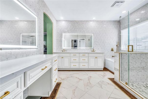 Bathroom, Dual Sink Vanities, Glass Shower, Interior, Marble, Marble Walls, Recessed Lighting