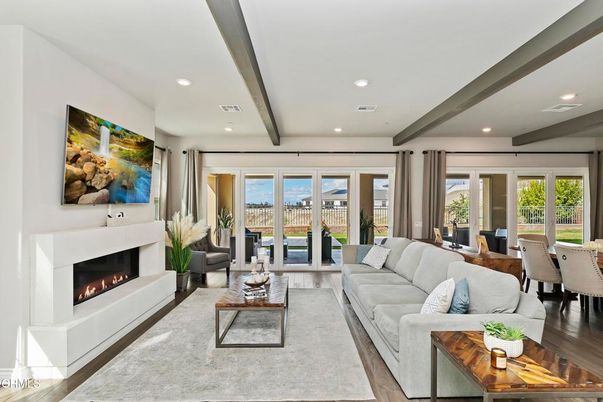 Dining room, Fireplace, Interior, Living room, Recessed Lighting, Wooden Beams, Wood Texture Flooring