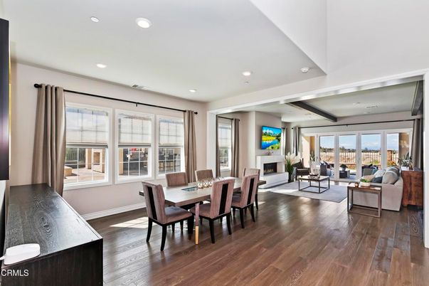 Dining room, Fireplace, Interior, Living room, Recessed Lighting, Wood Texture Flooring