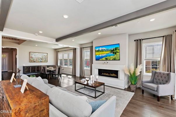 Dining room, Fireplace, Interior, Living room, Recessed Lighting, Wood Texture Flooring