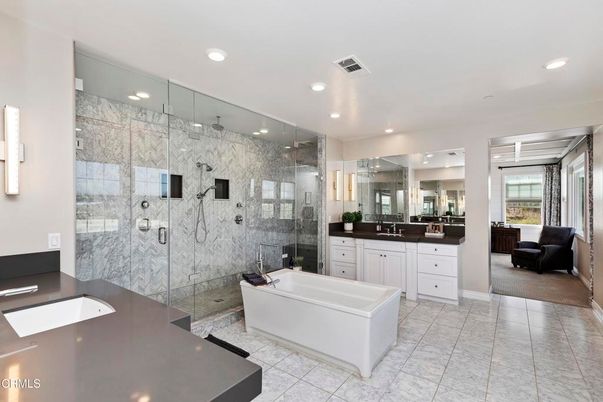 Bathroom, Dual Sink Vanities, Free Standing Baths, Glass Shower, Interior, Marble, Marble Walls, Recessed Lighting
