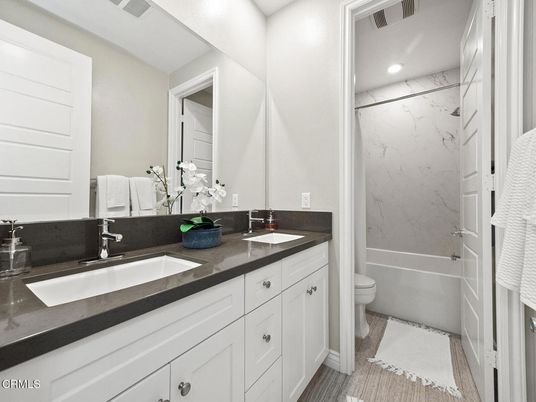 Bathroom, Dual Sink Vanities, Interior, Marble Walls, Recessed Lighting