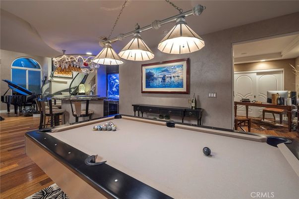 Billiard Table, Chandelier, Game Room, Interior, Piano, Recessed Lighting, Wood Texture Flooring