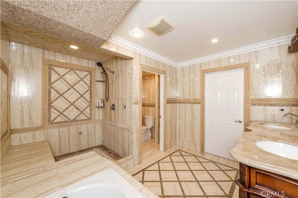 Bathroom, Dual Sink Vanities, Glass Shower, Interior, Recessed Lighting, Wood Texture Flooring