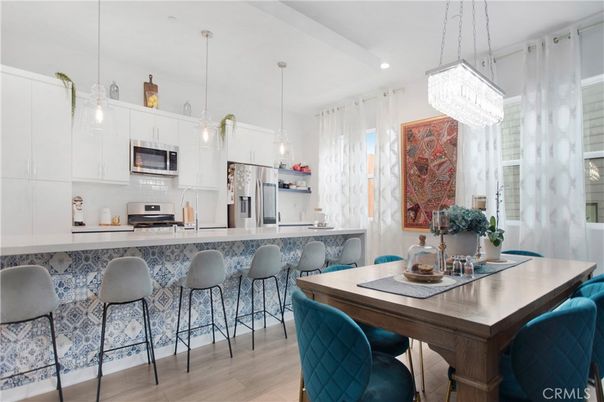 Chandelier, Interior, Kitchen, Pendant Lights, Recessed Lighting, Stainless Steel Appliances, Wood Texture Flooring
