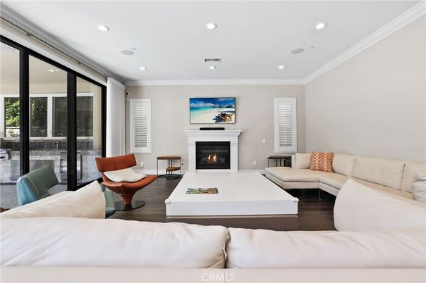 Bedroom, Fireplace, Interior, Living room, Recessed Lighting, Wood Texture Flooring