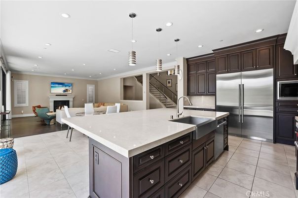 Dining room, Fireplace, Interior, Kitchen, Living room, Pendant Lights, Recessed Lighting, Stainless Steel Appliances
