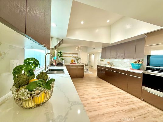 Chandelier, Interior, Kitchen, Recessed Lighting, Stainless Steel Appliances, Wood Texture Flooring