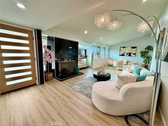 Chandelier, Fireplace, Interior, Living room, Recessed Lighting, Wood Texture Flooring