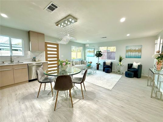 Chandelier, Dining room, Interior, Kitchen, Living room, Recessed Lighting, Stainless Steel Appliances, Wood Texture Flooring