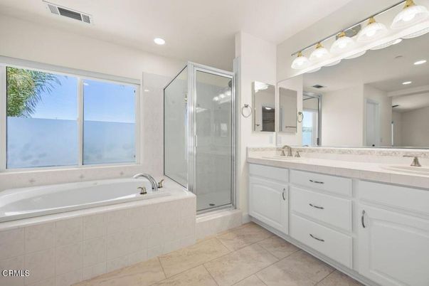 Bathroom, Dual Sink Vanities, Glass Shower, Interior, Recessed Lighting, Tile Countertops