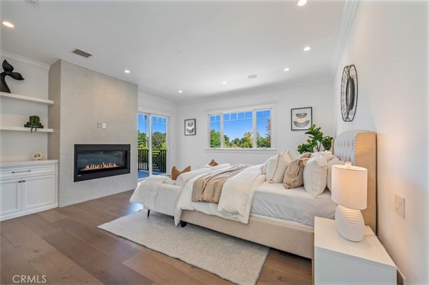 Bedroom, Fireplace, Interior, Recessed Lighting, Wood Texture Flooring