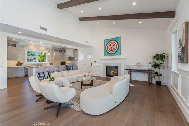 Fireplace, Interior, Kitchen, Living room, Pendant Lights, Recessed Lighting, Stainless Steel Appliances, Wooden Beams, Wood Texture Flooring