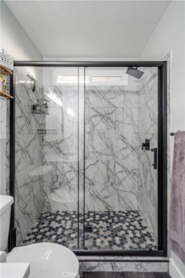 Bathroom, Glass Shower, Interior, Marble Walls, Wood Texture Flooring