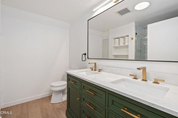 Bathroom, Dual Sink Vanities, Interior, Recessed Lighting, Wood Texture Flooring