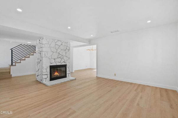Empty room, Fireplace, Interior, Recessed Lighting, Wood Texture Flooring