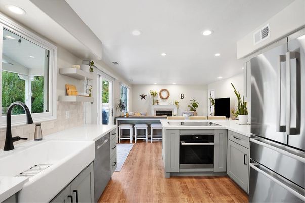 Dining room, Fireplace, Interior, Kitchen, Recessed Lighting, Stainless Steel Appliances, Wood Texture Flooring