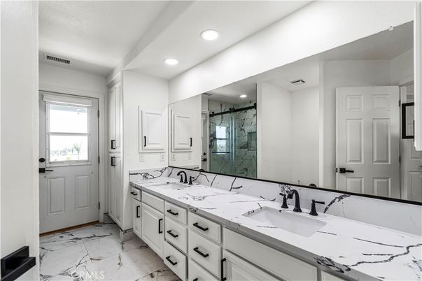 Bathroom, Dual Sink Vanities, Glass Shower, Interior, Marble, Recessed Lighting