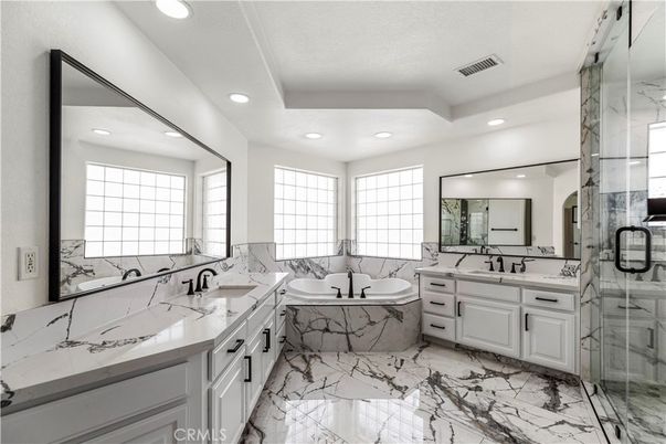 Bathroom, Dual Sink Vanities, Glass Shower, Interior, Marble, Recessed Lighting