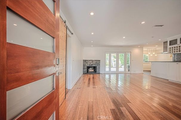 Empty room, Fireplace, Interior, Kitchen, Recessed Lighting, Wood Texture Flooring